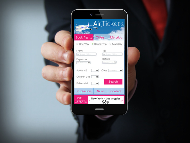 Businessman with ticket flight app on phone - Foto, imagen