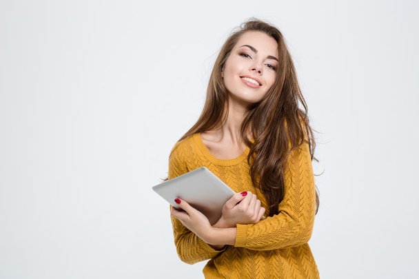Smiling pretty woman holding tablet computer - Foto, Imagem