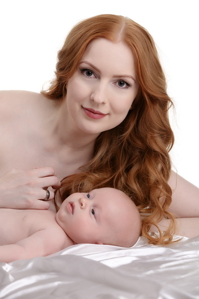Beautiful red-haired woman and her little son - Zdjęcie, obraz