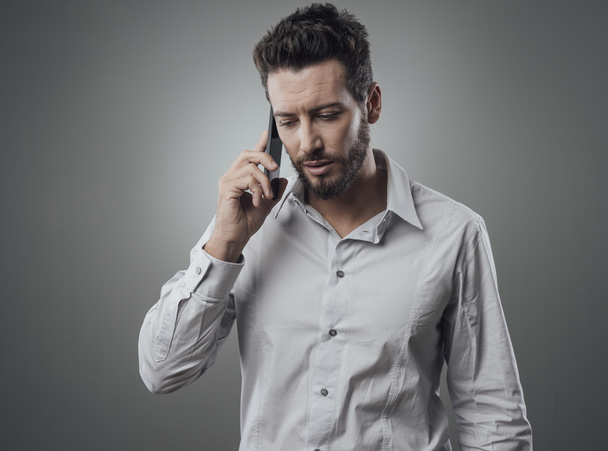 Confident businessman on the phone - Photo, Image
