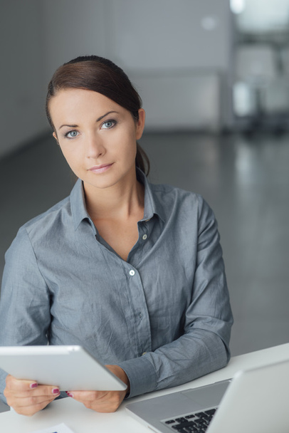 businesswoman using a digital tablet - Photo, Image
