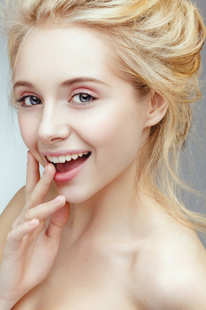 Beautiful attractive charming blonde caucasian model smiling. - Фото, зображення