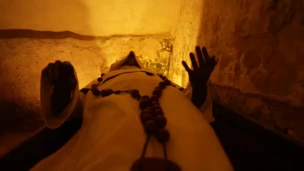 Old monk in a cave - Footage, Video