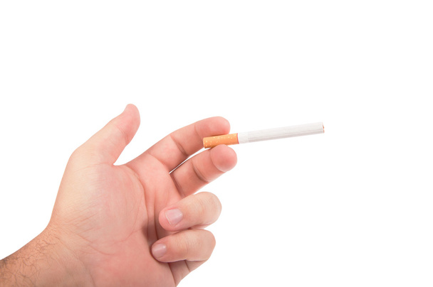 ruka držící cigaretu - Fotografie, Obrázek