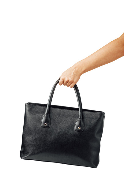 mão segurando bolsa de couro das mulheres
 - Foto, Imagem