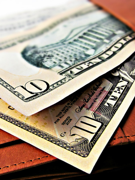Dez notas de 10 dólares em dinheiro - em uma carteira
 - Foto, Imagem