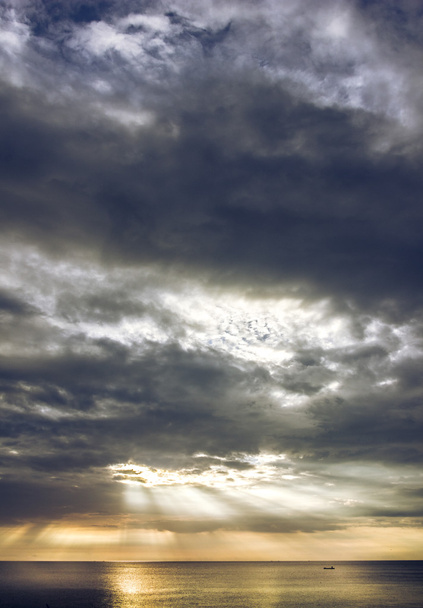 Light morning sun behind the clouds. - Valokuva, kuva