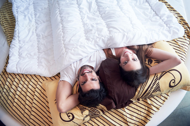 couple relax and have fun in bed - Photo, Image