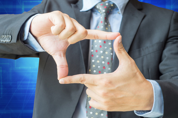Палець рамка дії бізнесмена з відсічним контуром
 - Фото, зображення