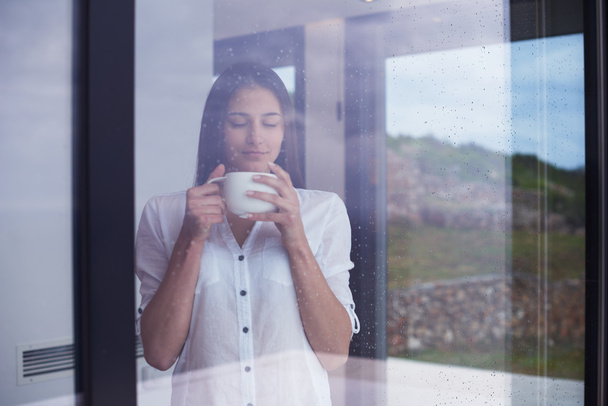young woman drink first morning coffee - Фото, изображение