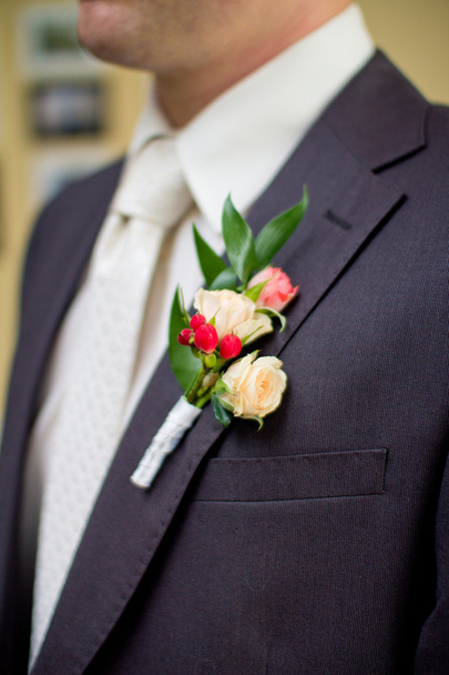 ジャケットに結婚式のブートニア - 写真・画像