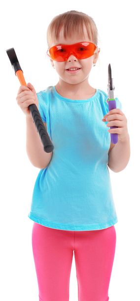 Little girl with tools on white - Foto, Imagen