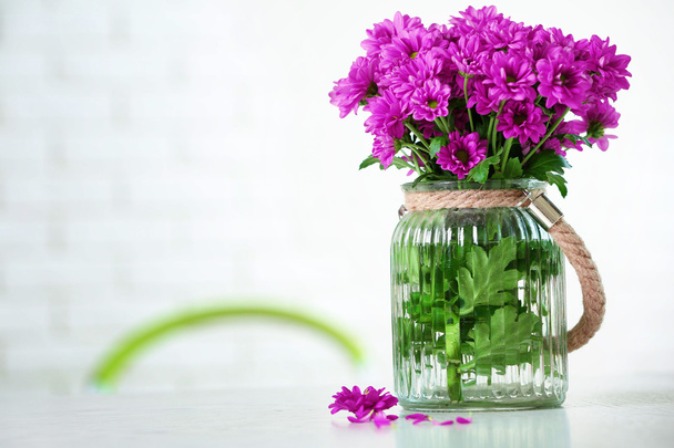 Beautiful flowers in vase - Фото, изображение
