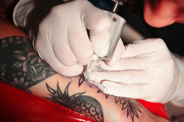 Professional tattoo artist  - Фото, изображение