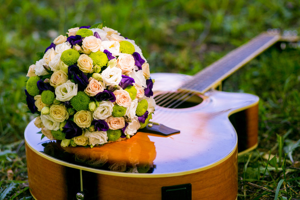 wedding bouquet on the guitar - Photo, Image