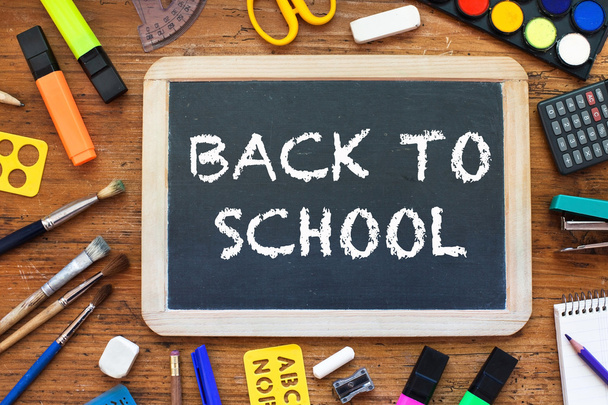 chalkboard and school supplies - Φωτογραφία, εικόνα