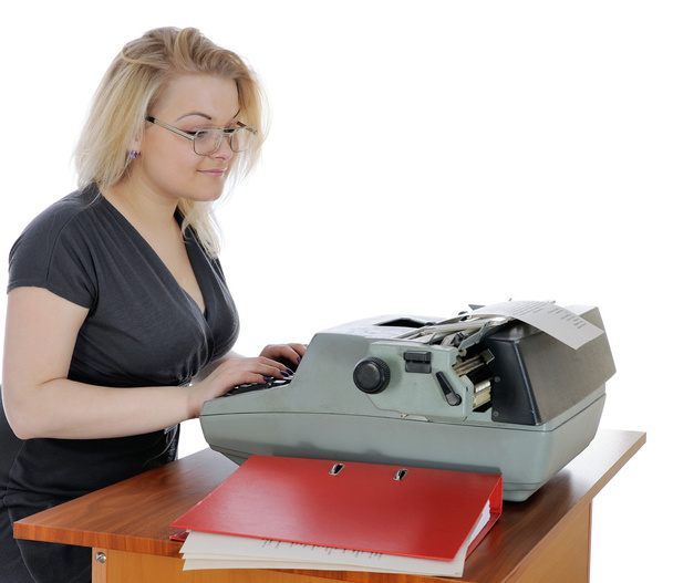 Mulher com máquina de escrever velha
 - Foto, Imagem