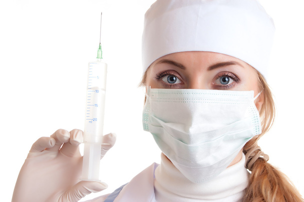 Doctor woman in mask and syringe - Photo, Image