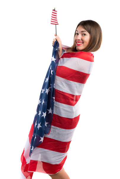 Girl holding an american flag - Foto, Imagen