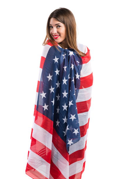 Girl holding an american flag - Foto, immagini