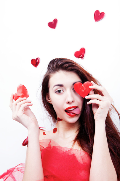 Brunette girl with red hearts - Photo, image