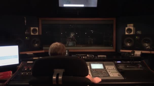 Engineer working at recording studio - Felvétel, videó