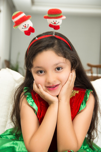 Cute little girl in Christmas clothes - Фото, зображення