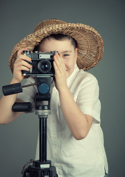 Niño con una cámara - Foto, Imagen