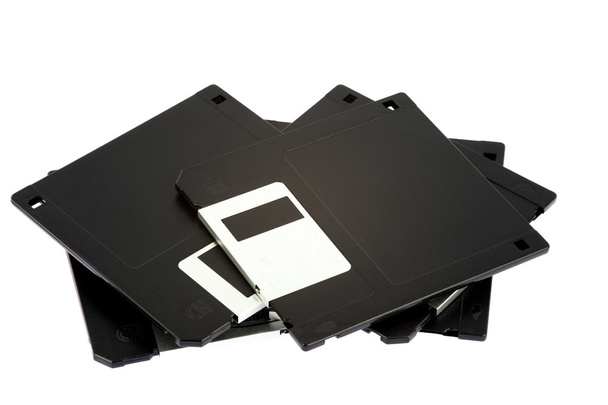 Застарілі комп'ютерні дискети на білому тлі
 - Фото, зображення