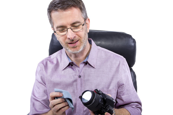 Professional photographer showing camera gear - Фото, зображення