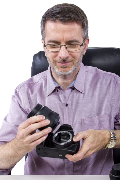 Professional photographer showing camera gear - Foto, Bild