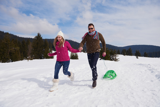 couple having fun in snow - Fotografie, Obrázek