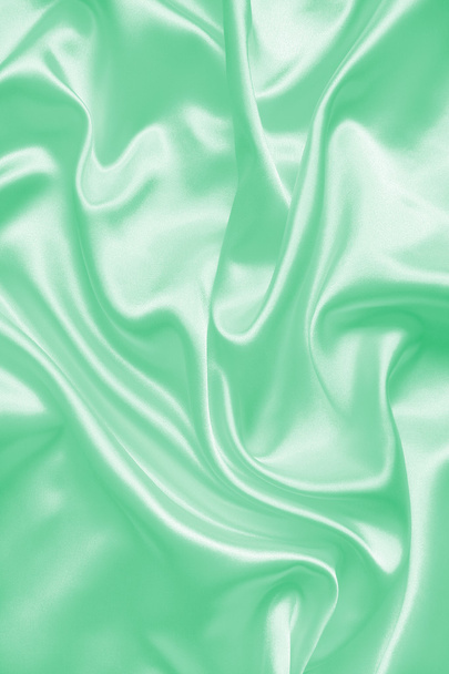 Smooth elegant green silk or satin texture as background - Foto, immagini