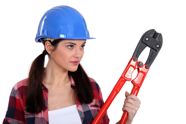 Brunette holding pair of bolt-cutters - Photo, Image