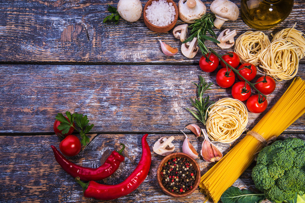 Pasta ingredients on wooden background - Foto, immagini