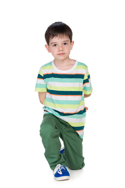 Cute young boy in ta striped shirt - Foto, afbeelding