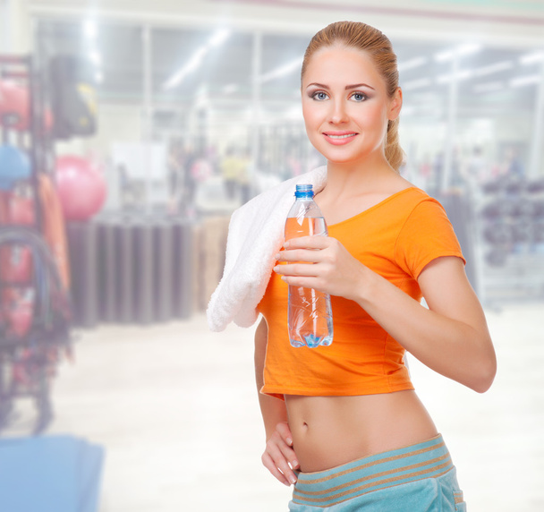 Young woman in fitness club - Photo, Image