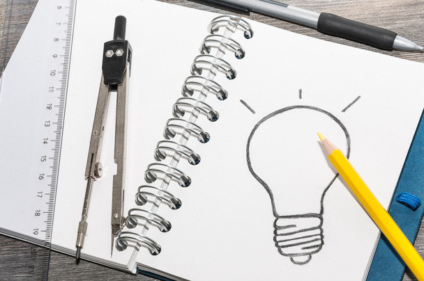 Dessiner une ampoule sur un bloc-notes
 - Photo, image