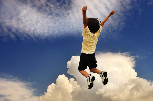 Kid celebrates, high jumping up, successful winner - Foto, Imagem