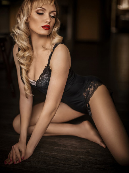 Blonde girl in black underclothes - Photo, Image