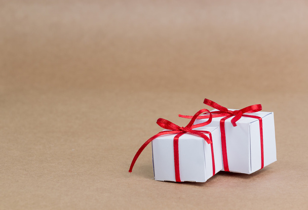 Classy Christmas gifts box presents on brown paper - 写真・画像