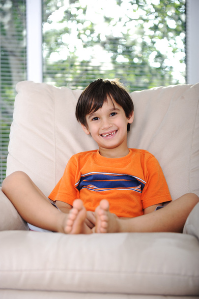Happy children sitting at home, indoor - Foto, imagen