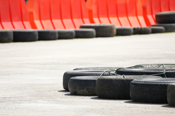 Race track barrier made of an old  tires for safety concept - Photo, Image