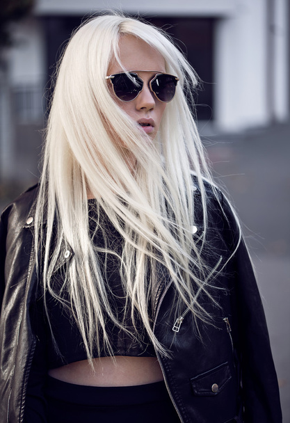 Cute blonde girl in sunglassses - 写真・画像