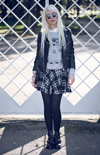 Pretty blonde young girl in posing outdoors - Foto, Bild