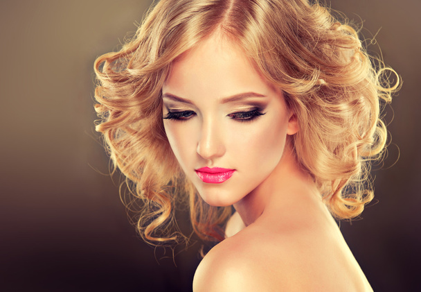 Blonde girl with luxury hairstyle and makeup - Photo, Image