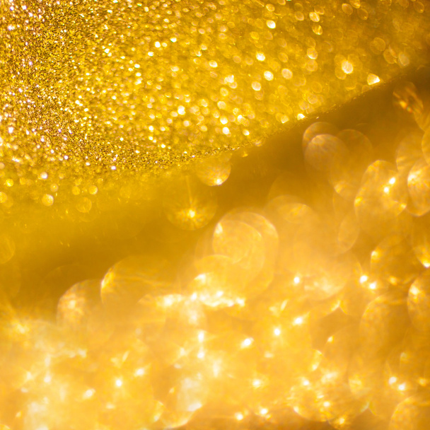 goldener Glanz Weihnachten abstrakten Hintergrund. Goldglänzende Lichter - Foto, Bild