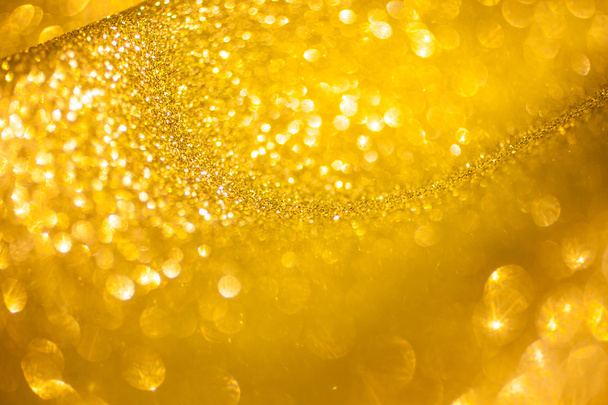 Fondo abstracto de Navidad brillo dorado. Luces doradas brillantes
 - Foto, imagen