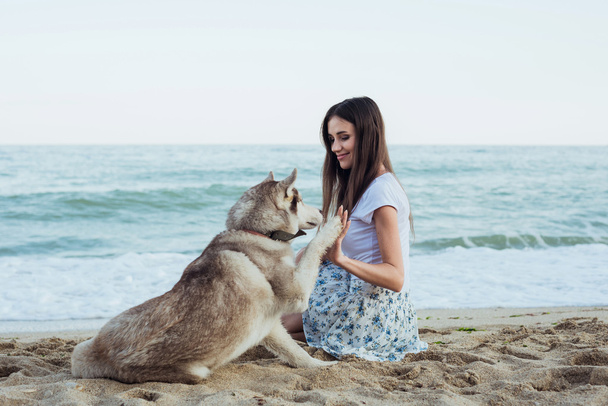 young caucasian female with dog - Foto, imagen
