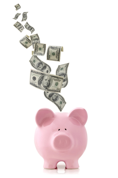 Money Falling into Piggy Bank - Фото, зображення